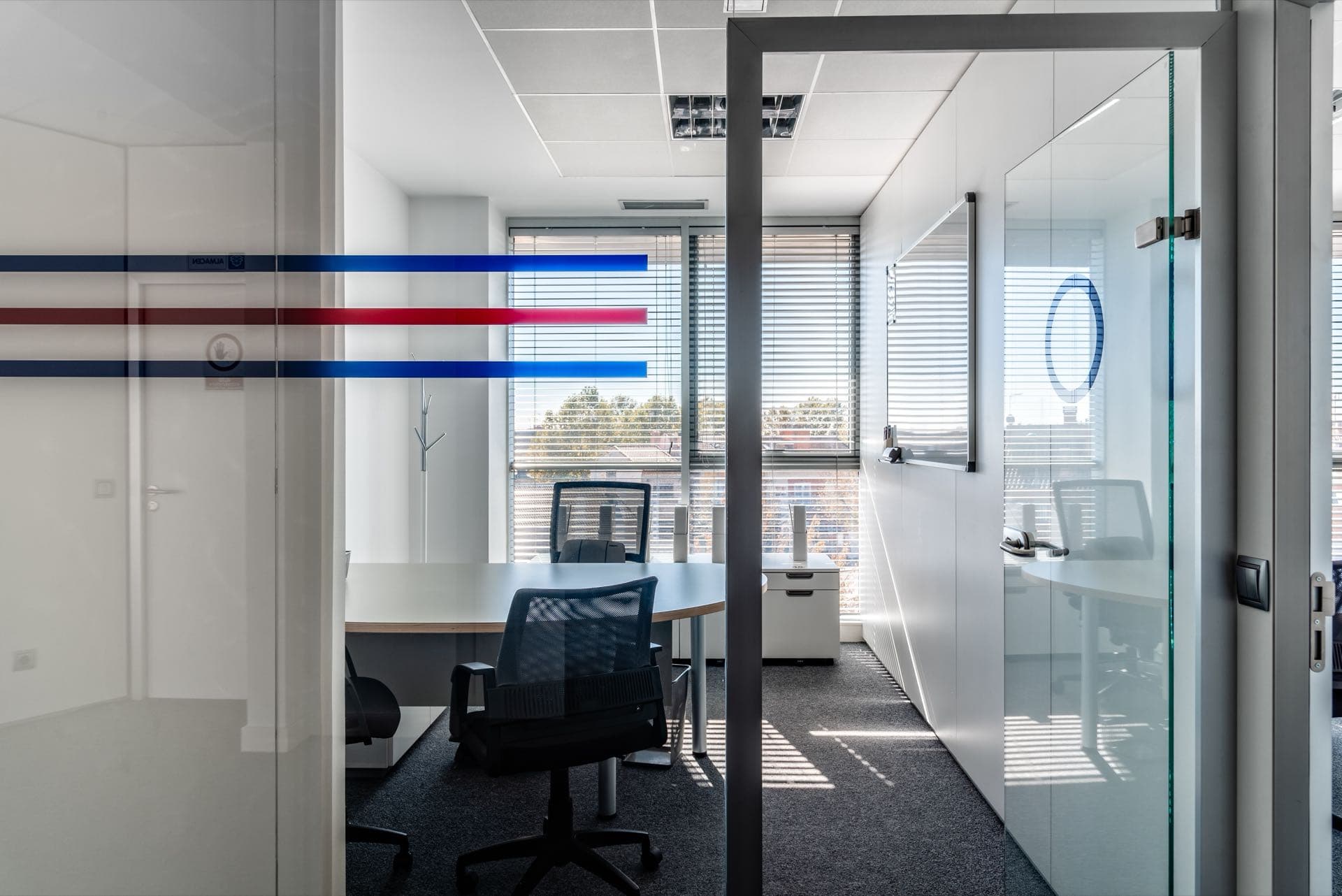 Glass Partitions in Dubai: Modern coworking office divided by glass partition walls