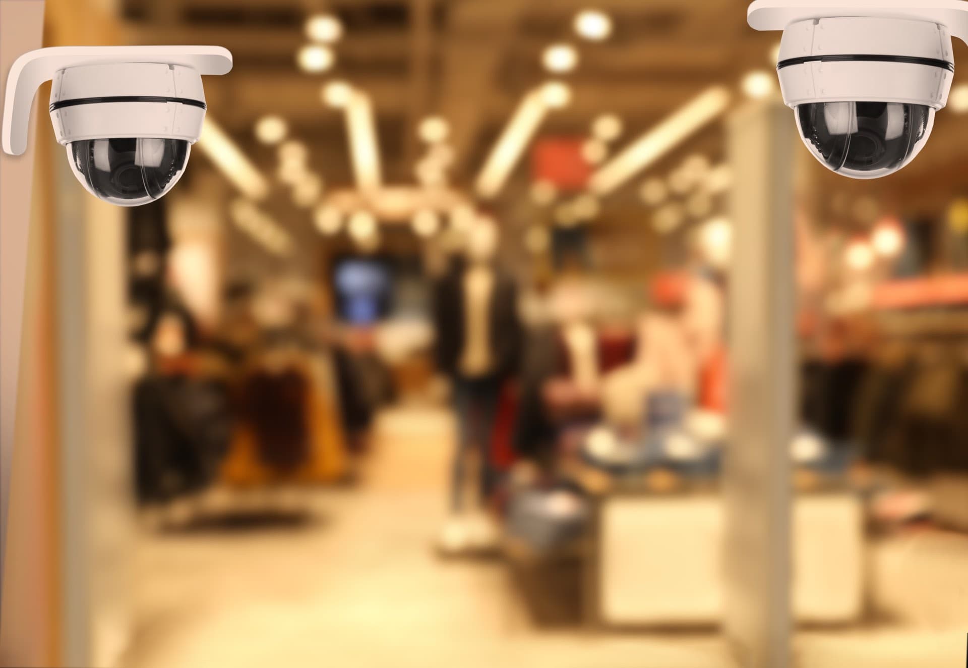 Shop and Office CCTV Installation in Dubai: Two dome CCTV cameras overlooking a shop floor in Dubai